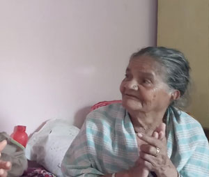 One Loving Elderly lady singing a Traditional festive song